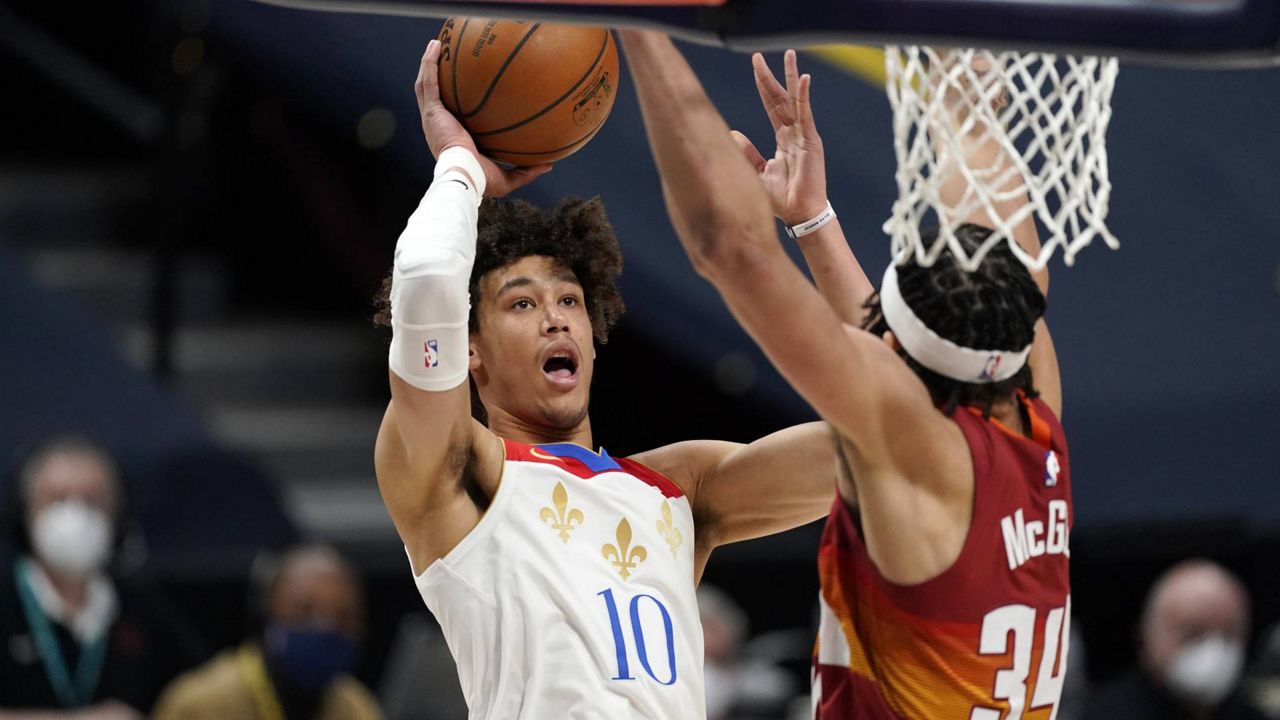 New Orleans Pelicans center Jaxson Hayes (10) shoots over Denver Nuggets center JaVale McGee (34) in the second half of an NBA basketball game April 28, 2021, in Denver. (AP Photo/David Zalubowski)
