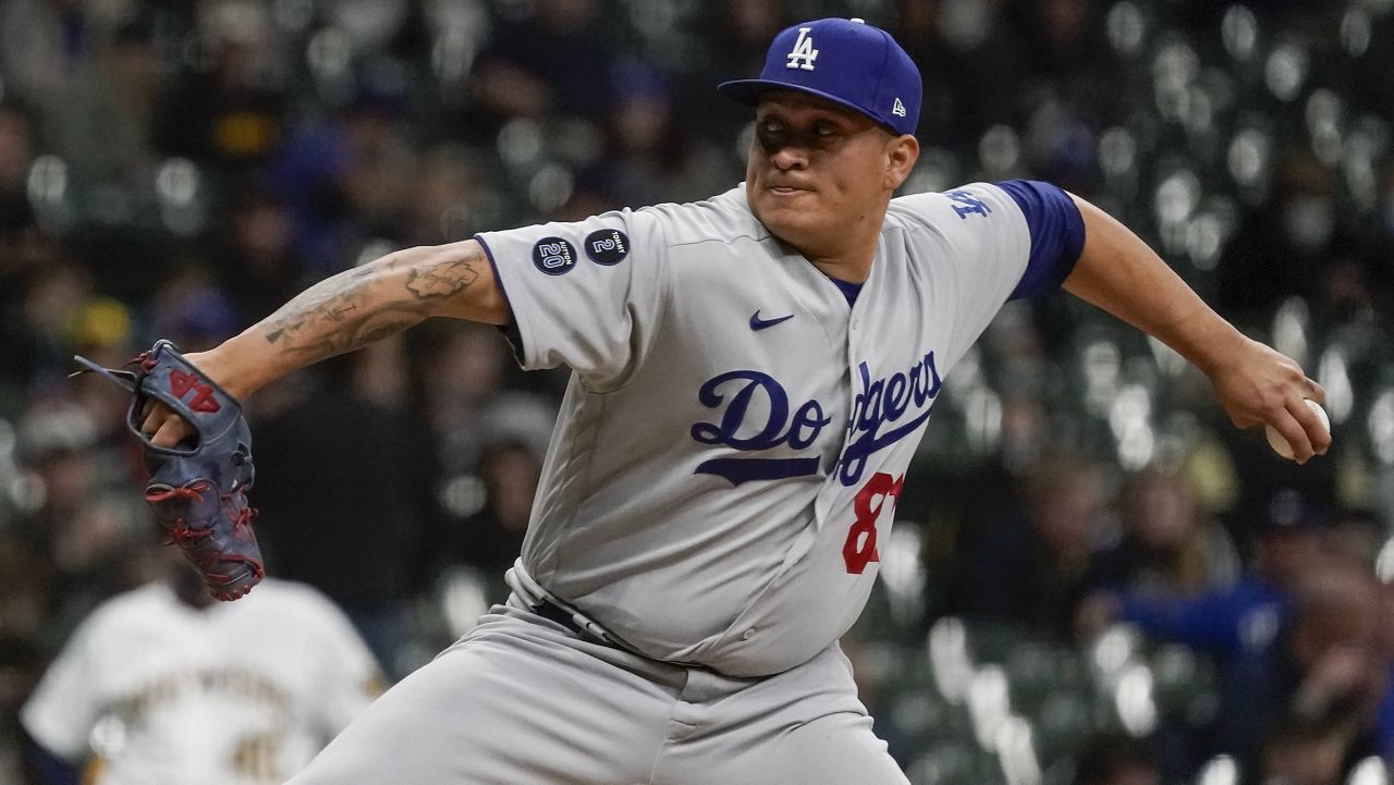 Los Angeles Dodgers' Victor Gonzalez throws during the sixth inning of a baseball game against the Milwaukee Brewers Friday, April 30, 2021, in Milwaukee. (AP Photo/Morry Gash)