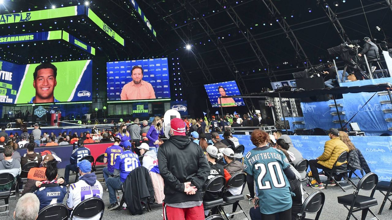 The sixth round of the NFL draft plays out in The Draft Theatre, Saturday, May 1, 2021, in Cleveland. (AP Photo/David Dermer)