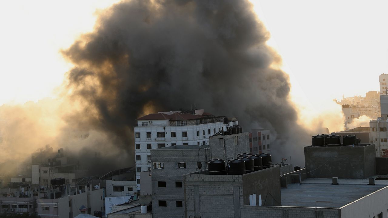 Smoke rises following Israeli airstrikes on a building in Gaza City, Wednesday, May 12, 2021. (AP Photo/Adel Hana)