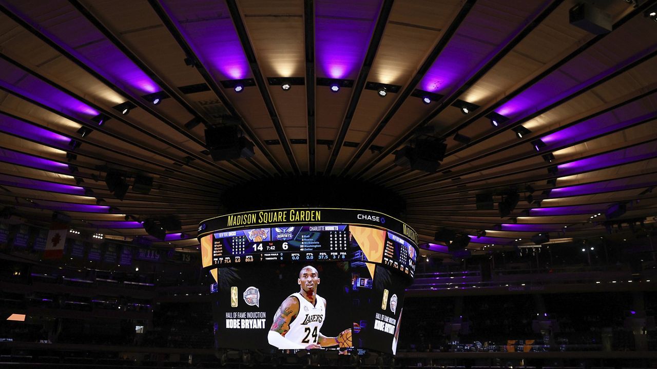 An image of the late Kobe Bryant is displayed on the scoreboard as the New York Knicks honor his induction into the Basketball Hall of Fame before an NBA basketball game against the Charlotte Hornets at Madison Square Garden, Saturday, May 15, 2021, in New York. (Elsa/Pool Photo via AP)