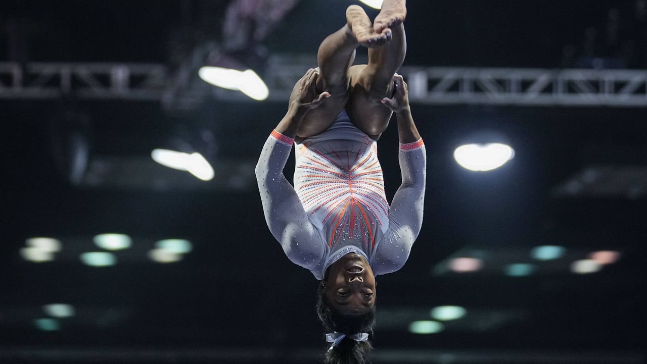 Simone Biles performs during the vault at the U.S. Classic gymnastics meet in Indianapolis, Saturday, May 22, 2021. (AP Photo/AJ Mast)