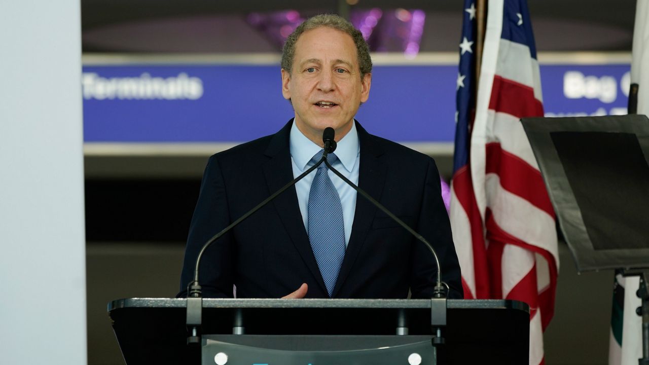 Justin Erbacci, Los Angeles World Airports CEO, speaks a press conference at the new West Gates at Tom Bradley International Terminal at Los Angeles International Airport Monday, May 24, 2021, in Los Angeles. (AP Photo/Ashley Landis)