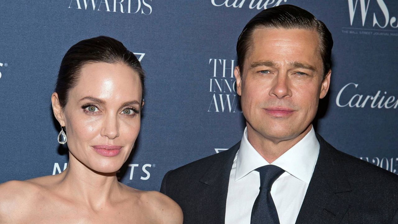 Angelina Jolie Pitt and Brad Pitt pose for a photo at the WSJ Magazine Innovator Awards 2015 at The Museum of Modern Art in New York on Nov. 4, 2015. (Photo by Charles Sykes/Invision/AP)
