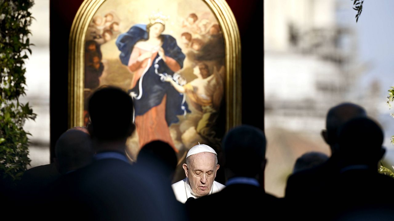 Pope Francis leads prayer in the Vatican gardens Monday. (Filippo Monteforte/Pool photo via AP)