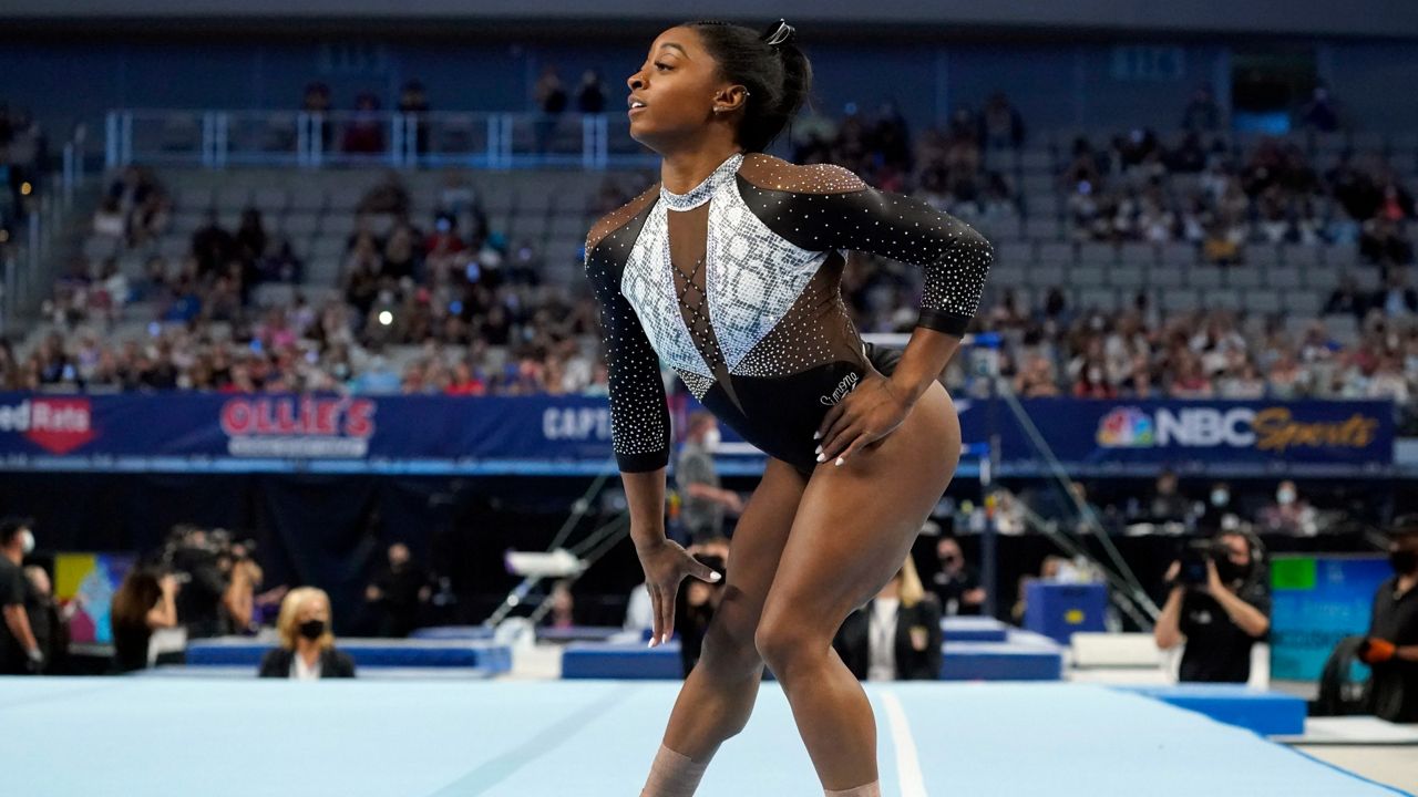 Simone Biles competes in the floor exercise during the U.S. Gymnastics Championships, Sunday, June 6, 2021, in Fort Worth, Texas. (AP Photo/Tony Gutierrez)
