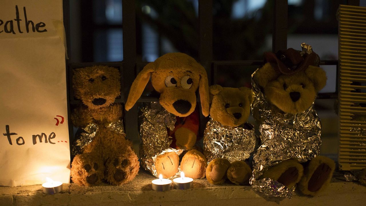 In this 2018, file photo, stuffed toy animals wrapped in aluminum foil representing migrant children separated from their families are displayed in protest in front of the United States embassy in Guatemala City. (AP Photo/Luis Soto, File) 
