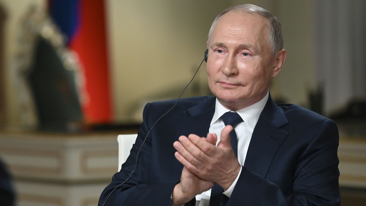 Russian President Vladimir Putin gestures while speaking to NBC News journalist Keir Simmons in an interview aired on Monday, June 14, 2021, two days before the Russian leader is to meet U.S. President Joe Biden in Geneva. (Maxim Blinov, Sputnik, Kremlin Pool Photo via AP)