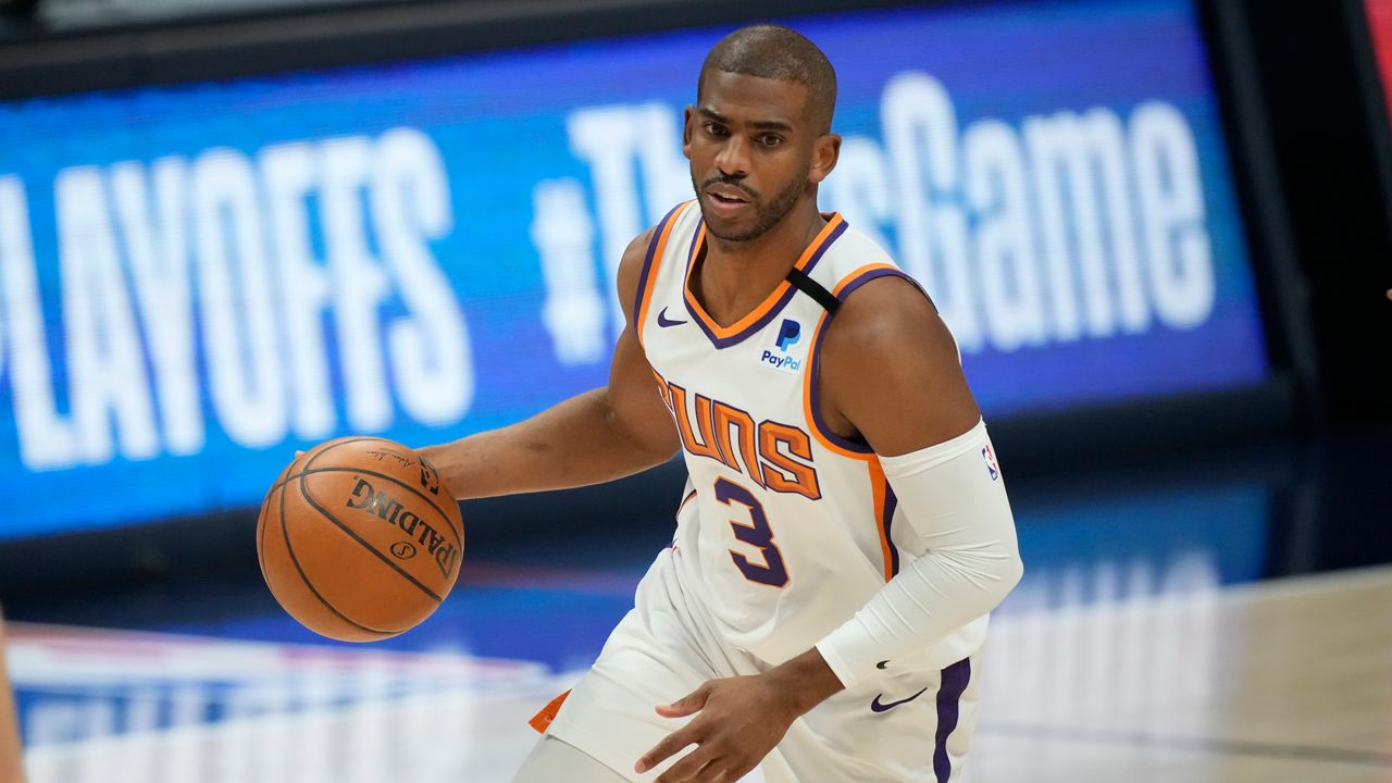 Phoenix Suns guard Chris Paul (3) in the first half of Game 4 of an NBA second-round playoff series Sunday, June 13, 2021, in Denver. (AP Photo/David Zalubowski)