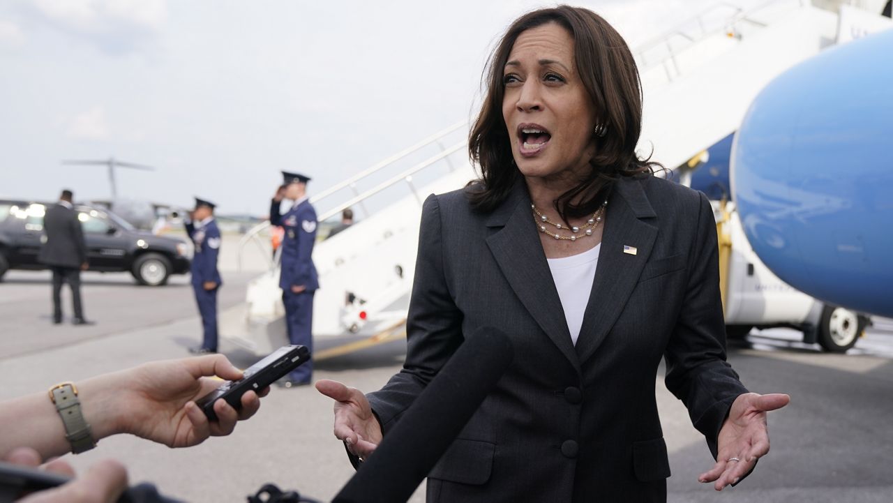 Vice President Kamala Harris speaks to members of the media before boarding Air Force Two, Friday, June 18, 2021, to depart Atlanta and return to Washington. (AP Photo/Jacquelyn Martin)