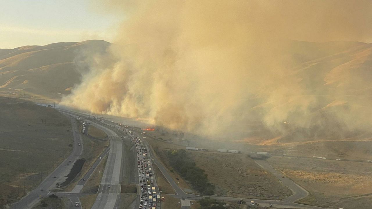 This aerial picture released via @LACoFireAirOps by the LA County Fire Department Air Operations shows the Tumbleweed brush fire in Gorman, Calif., Sunday, July 4, 2021. (LA County Fire Department Air Operations via AP)