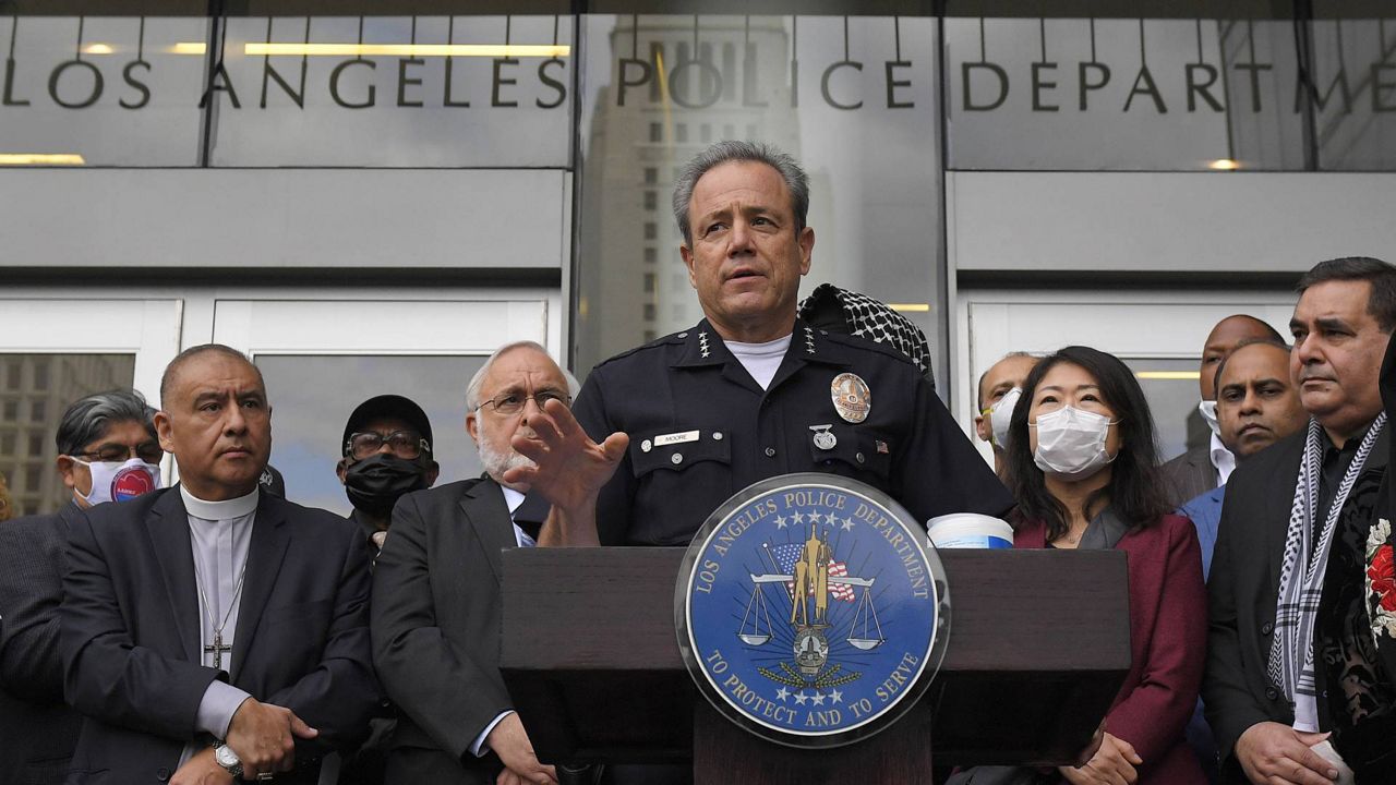 In this June 5, 2020, file photo, Los Angeles police chief Michel Moore speaks during a vigil with members of professional associations and the interfaith community at LAPD headquarters. (AP Photo/Mark J. Terrill)