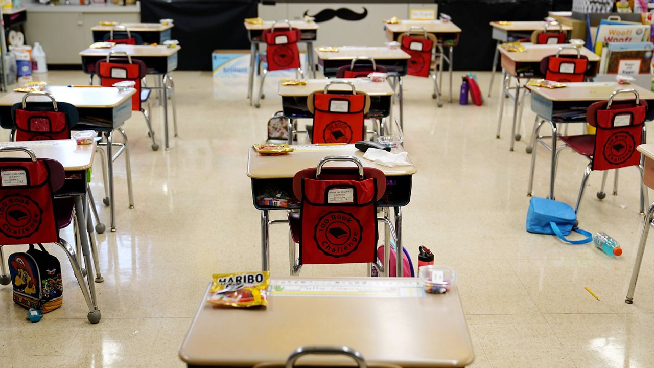 In this March 11, 2021, file photo, desks are arranged in a classroom at an elementary school in Nesquehoning, Pa. (AP Photo/Matt Slocum, File)