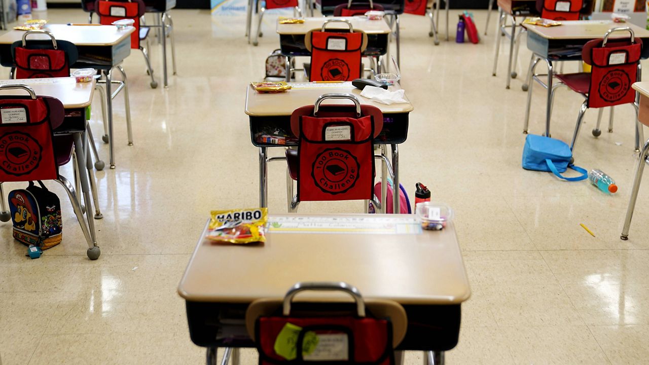 Desks are arranged in a classroom at an elementary school in Nesquehoning, Pa. (AP Photo/Matt Slocum, File)