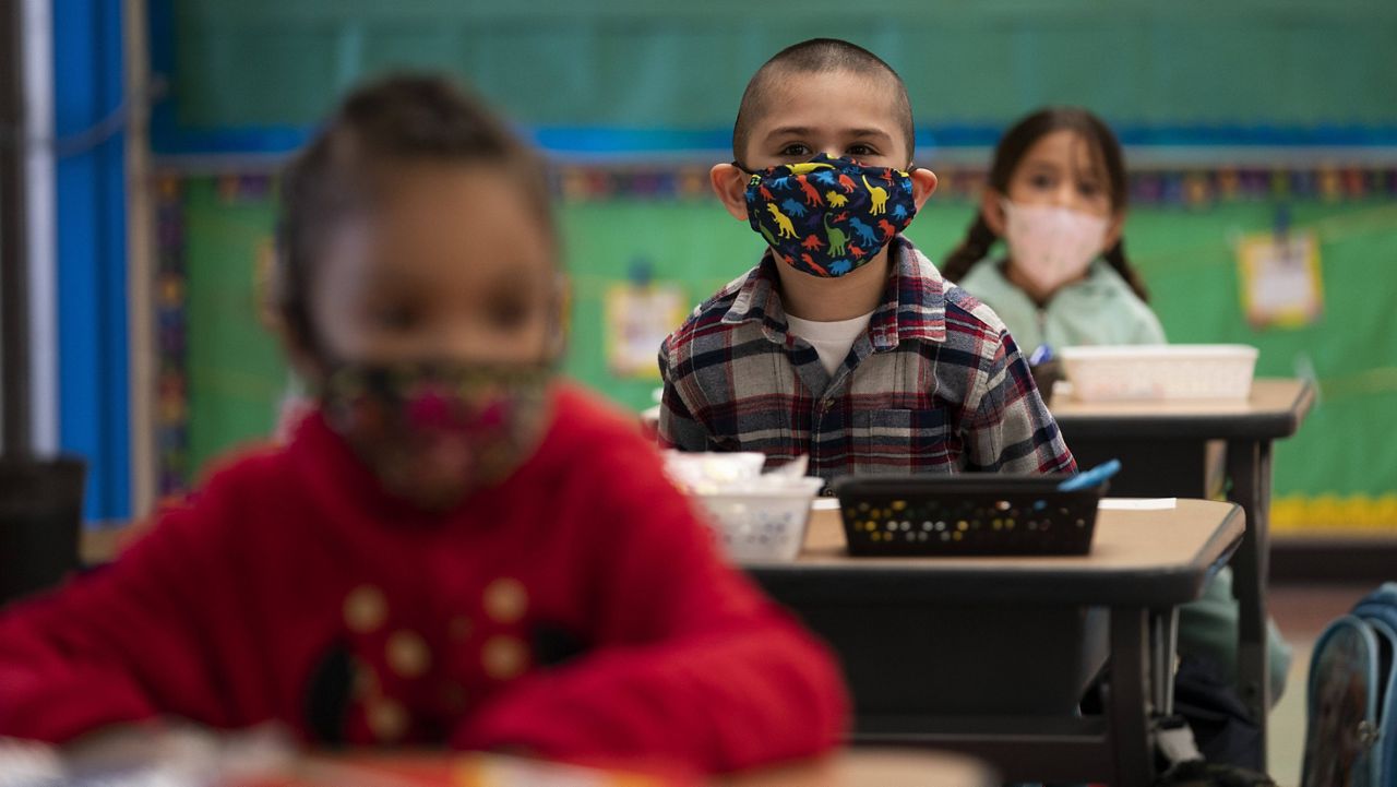 In this April 13, 2021, file photo, kindergarten students wear masks at Maurice Sendak Elementary School in Los Angeles. (AP Photo/Jae C. Hong, File)