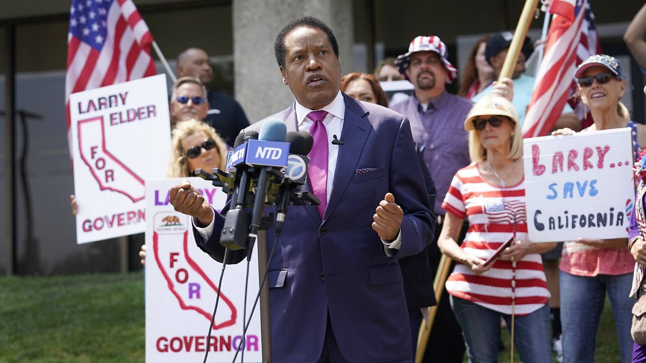 Radio talk show host Larry Elder speaks to supporters during a campaign stop Tuesday, July 13, 2021, in Norwalk, Calif. Elder announced Monday that he is running for governor of California. (AP Photo/Marcio Jose Sanchez)