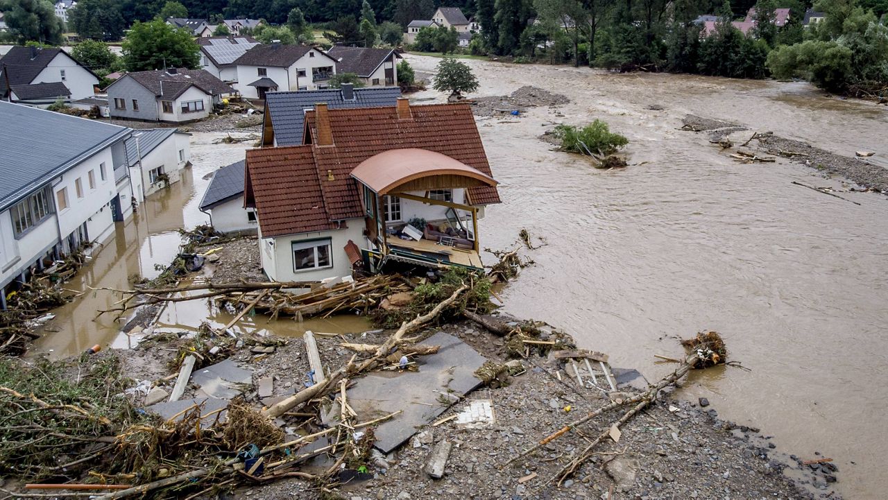 A damaged house is seen at the Ahr River in Insul, Germany, on Thursday. (AP Photo/Michael Probst)