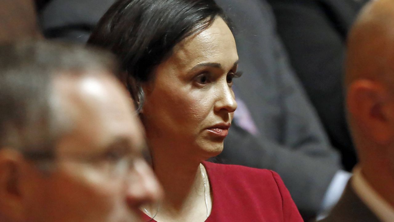 In this Nov. 6, 2019, file photo, California Republican Party chairwoman Jessica Millan Patterson listens as lawyers present their arguments for and against a recently approved state law before the California Supreme Court in Sacramento, Calif. (AP Photo/Rich Pedroncelli, Pool, File)