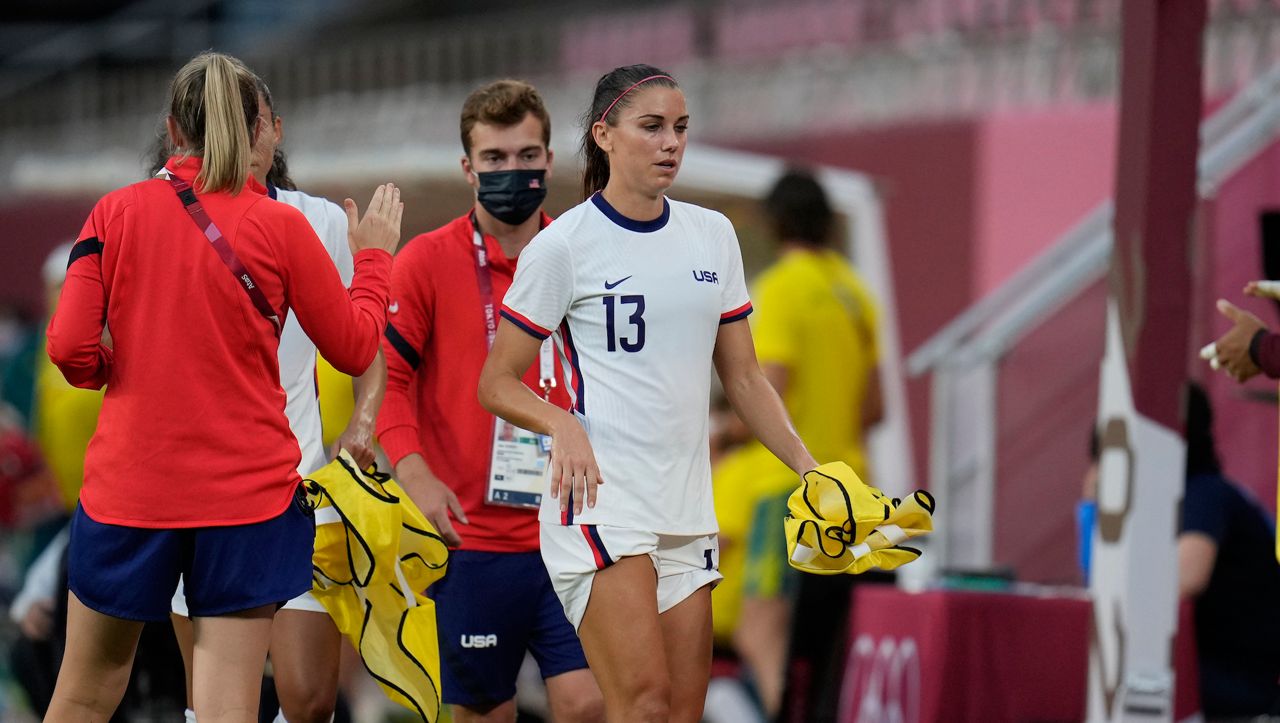 United States' Alex Morgan leaves the field during second half of a women's soccer match against Australia at the 2020 Summer Olympics, Tuesday, July 27, 2021, in Kashima, Japan. 