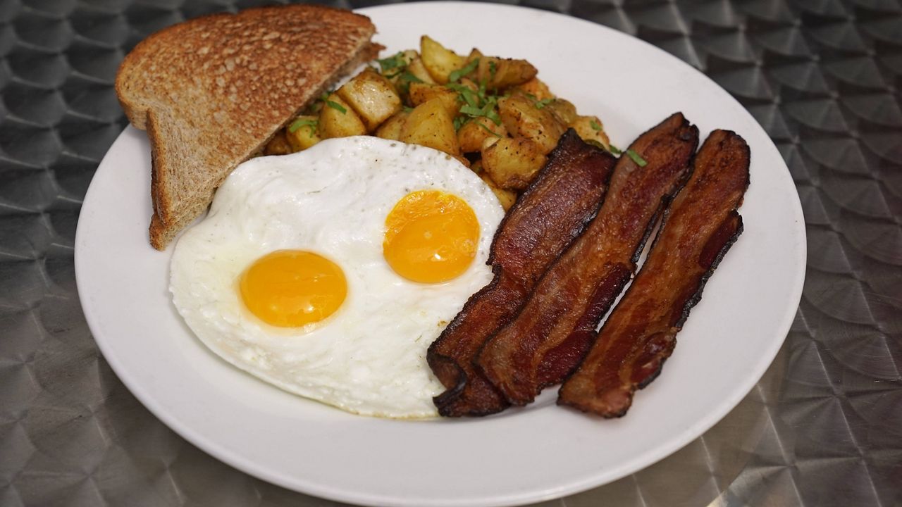 Jeannie Kim's popular bacon and eggs breakfast is seen outside her restaurant in San Francisco on Friday, July 30, 2021. (AP Photo/Eric Risberg)