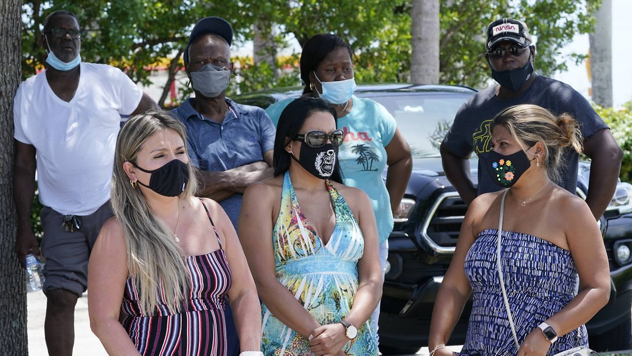 A group waits to get COVID-19 tests Saturday in North Miami, Fla. (AP Photo/Marta Lavandier)