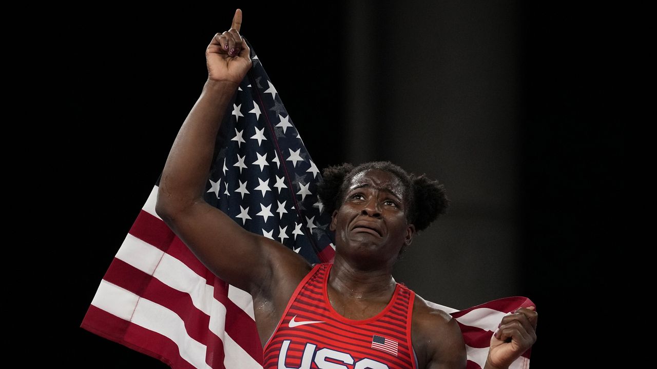 United States wrestler Tamyra Mensah-Stock celebrates defeating Nigeria's Blessing Oborududu and winning the women's 68kg Freestyle wrestling final match at the 2020 Summer Olympics, Tuesday, Aug. 3, 2021, in Chiba, Japan. (AP Photo/Aaron Favila)
