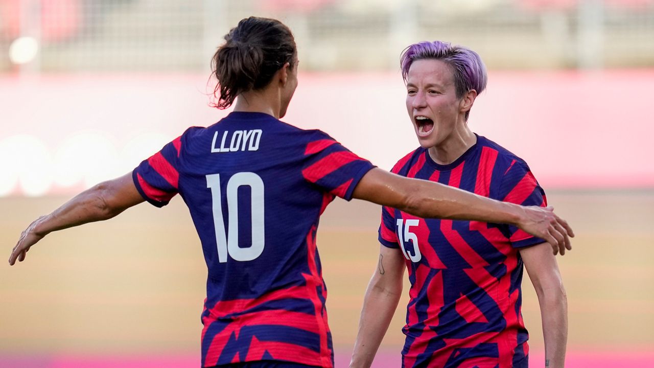 United States' Megan Rapinoe celebrates scoring her side's 2nd goal against Australia in the women's bronze medal soccer match at the 2020 Summer Olympics, Thursday, Aug. 5, 2021, in Kashima, Japan. (AP Photo/Andre Penner)