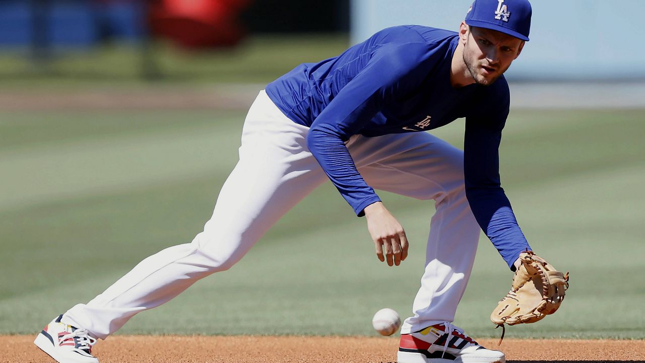 Los Angeles Dodgers second baseman Trea Turner looks on during the