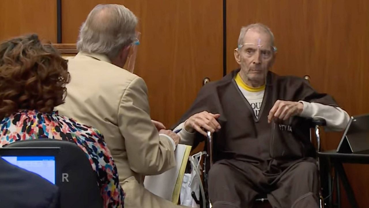 Real estate heir Robert Durst, right, describes what ailments he has to defense attorney Dick Deguerin during his murder trial on Monday, Aug. 9, 2021, in Los Angeles County Superior Court in Inglewood, Calif. (Law & Crime Network via AP, Pool)