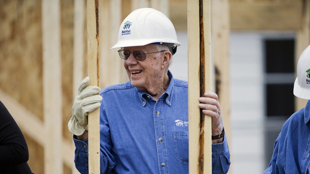 FILE - In this Nov. 2, 2015, file photo, former President Jimmy Carter works at a Habitat for Humanity building site in Memphis, Tenn. (AP Photo/Mark Humphrey, File)