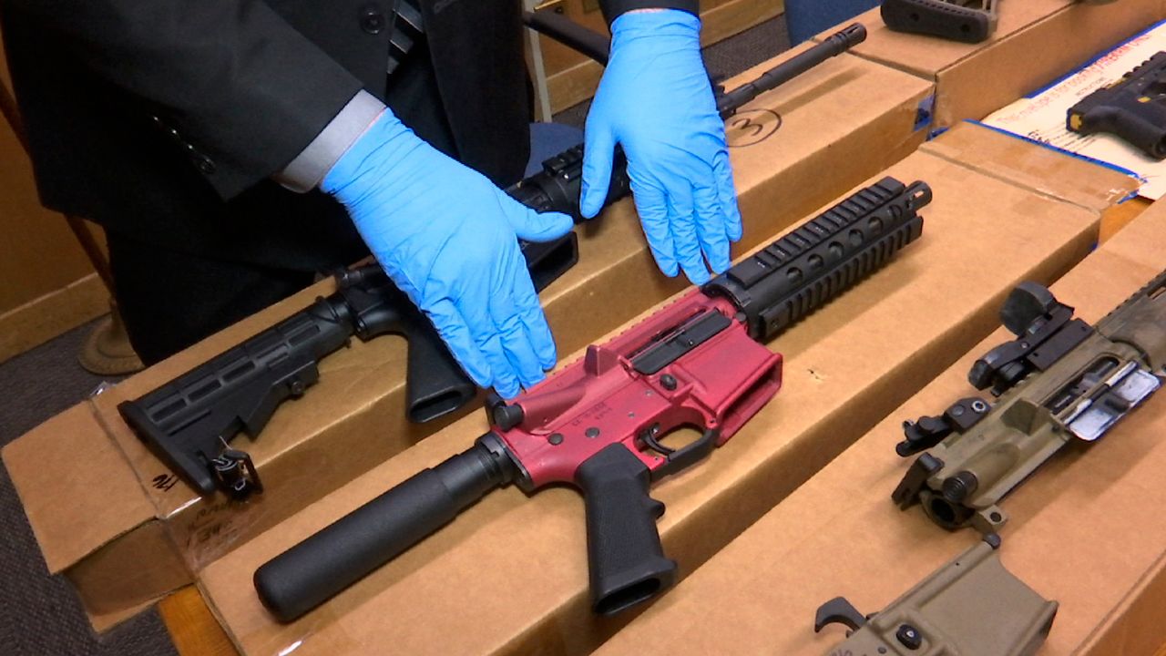 In this Nov. 27, 2019 file photo, "ghost guns" are displayed at the headquarters of the San Francisco Police Department. (AP Photo/Haven Daley)