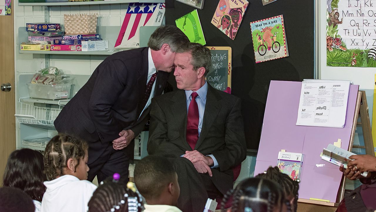 The moment President George W. Bush learned of the plane crashes into the World Trade Center, on Sept. 11, 2001, during a visit to the Emma E. Booker Elementary School in Sarasota, Fla. (AP Photo/Doug Mills, File)
