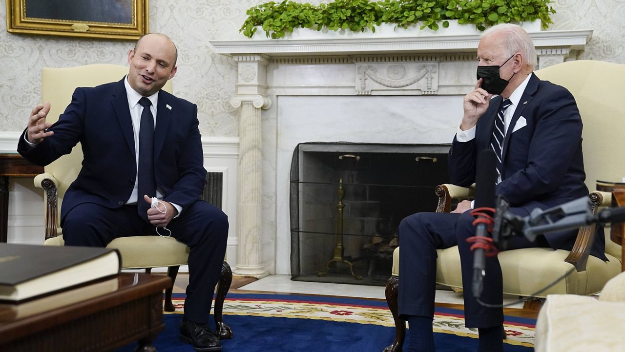 Israeli Prime Minister Naftali Bennett speaks as he meets with President Joe Biden in the Oval Office of the White House on Friday. (AP Photo/Evan Vucci)