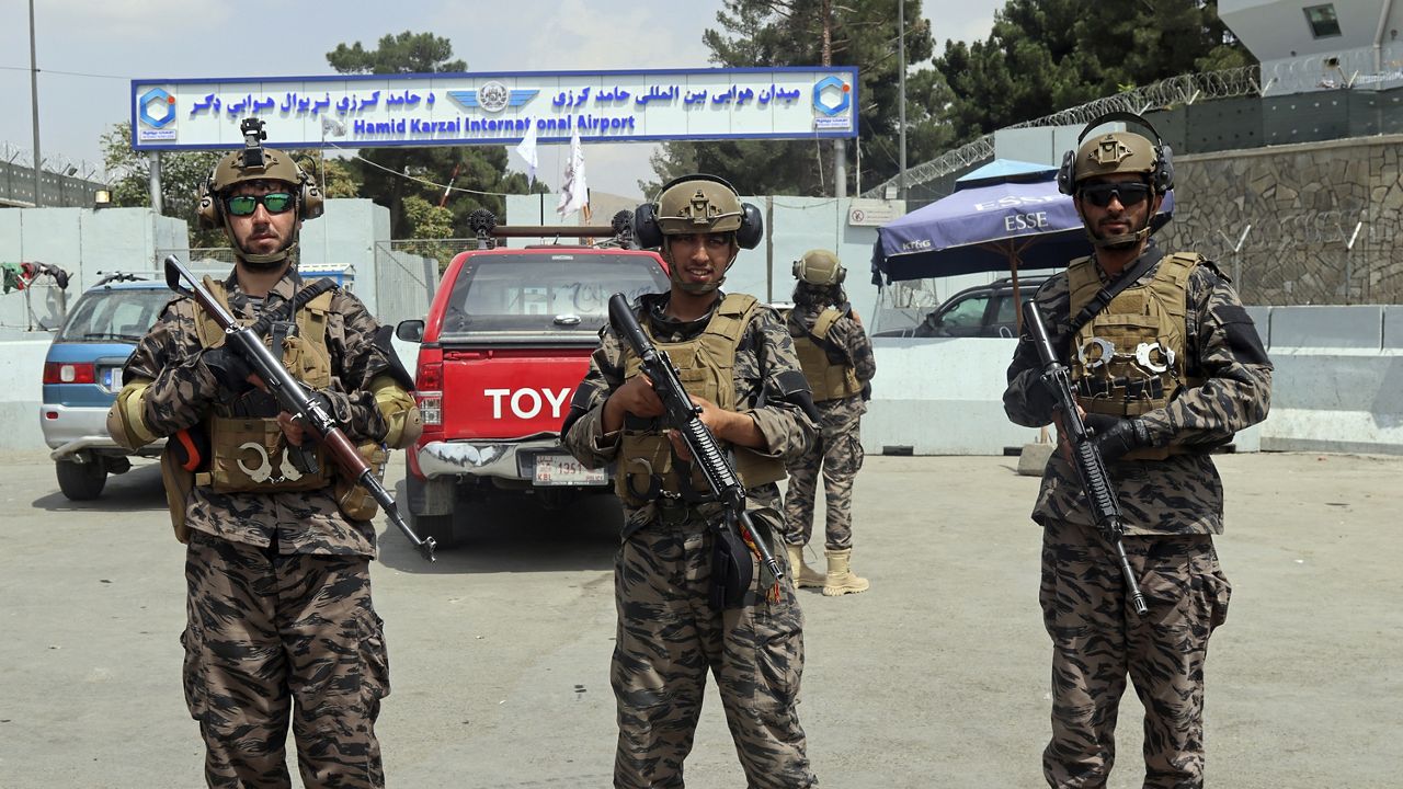 Taliban special forces fighters stand guard outside the Hamid Karzai International Airport after the U.S. military's withdrawal, in Kabul, Afghanistan, Tuesday, Aug. 31, 2021. (AP Photo/Khwaja Tawfiq Sediqi)