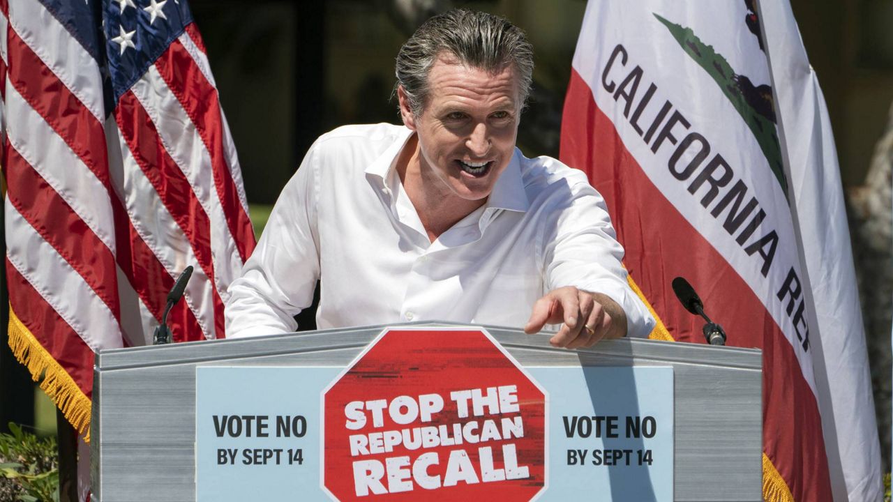 California Gov. Gavin Newsom campaigns against the recall election at Culver City High School in Culver City, Calif., Saturday, Sept. 4, 2021. (AP Photo/Damian Dovarganes)