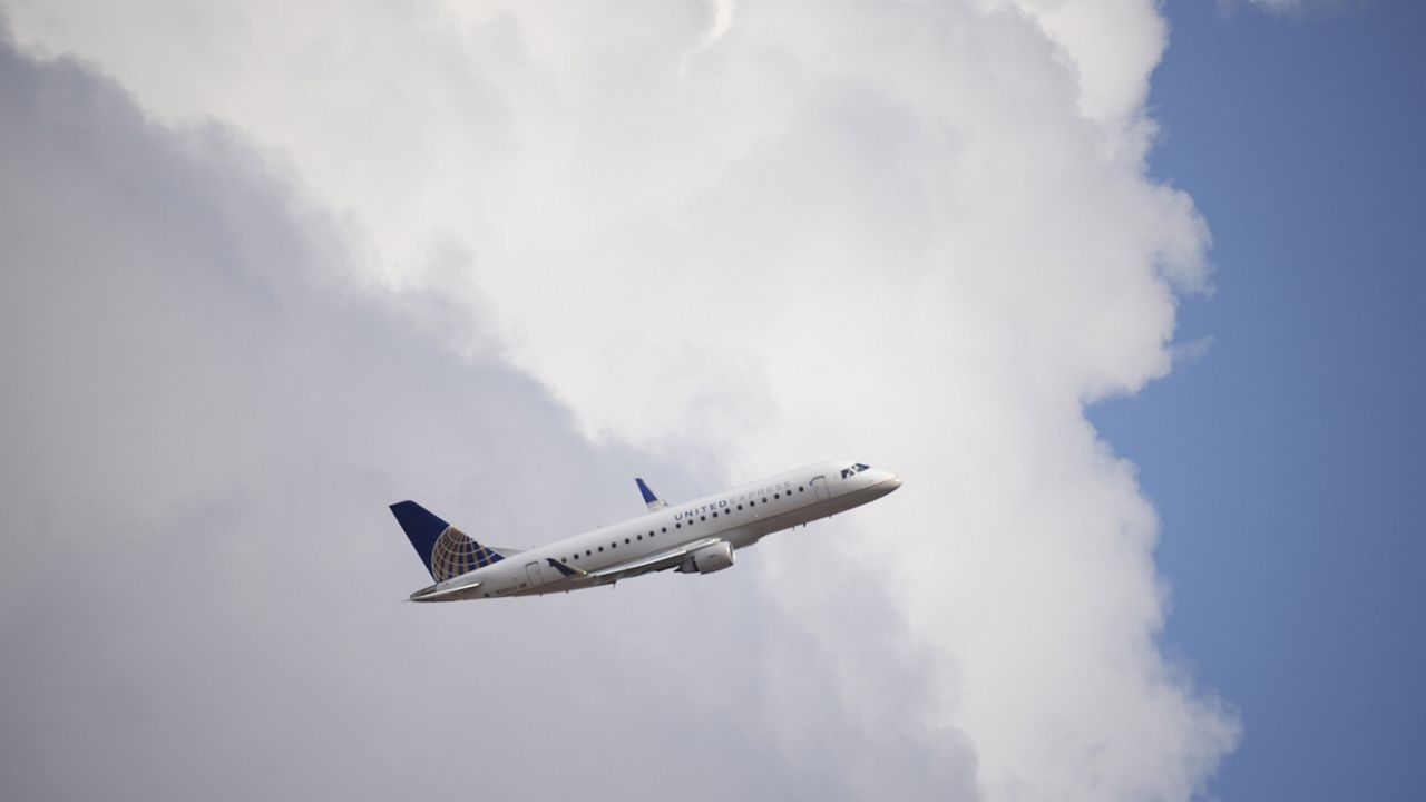 A United Airlines jetliner takes off from a runway at Denver International Airport Tuesday, Sept. 14, 2021, in Denver. (AP Photo/David Zalubowski)