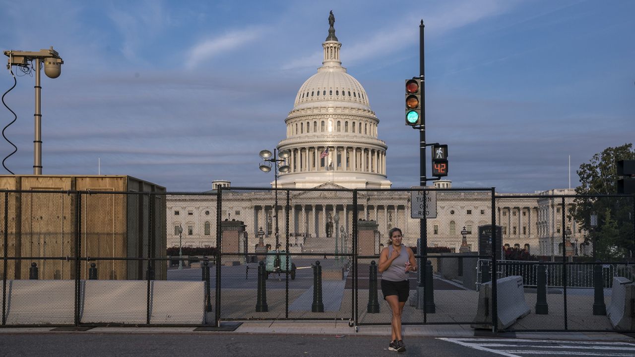 Fencing has been reinstalled around the Capitol in Washington, Thursday, Sept. 16, 2021, ahead of a planned rally by far-right supporters of former President Donald Trump who are demanding the release of rioters arrested in connection with the 6 January insurrection. (AP Photo/J. Scott Applewhite)