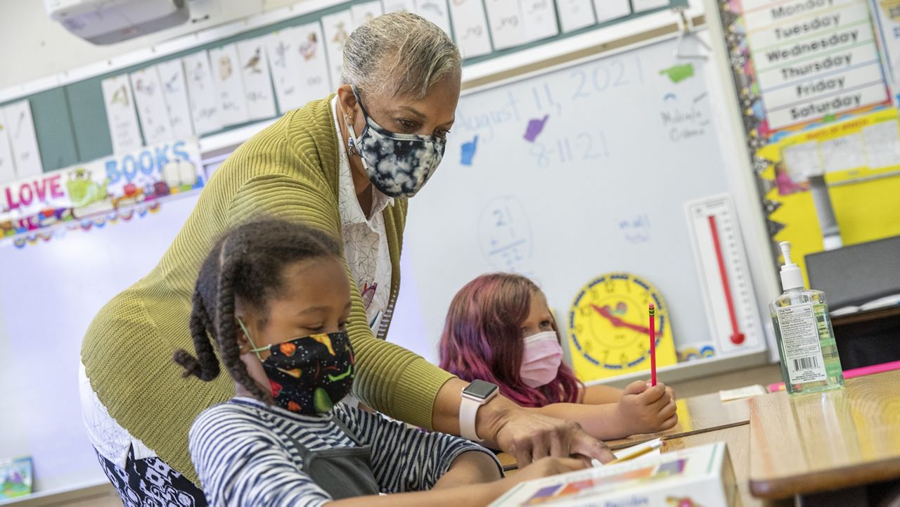 FILE — In this Aug. 11, 2021, file photo Joy Harrison instructs her second graders at Carl B. Munck Elementary School, in Oakland, Calif. (Santiago Mejia/San Francisco Chronicle via AP, Pool, File)