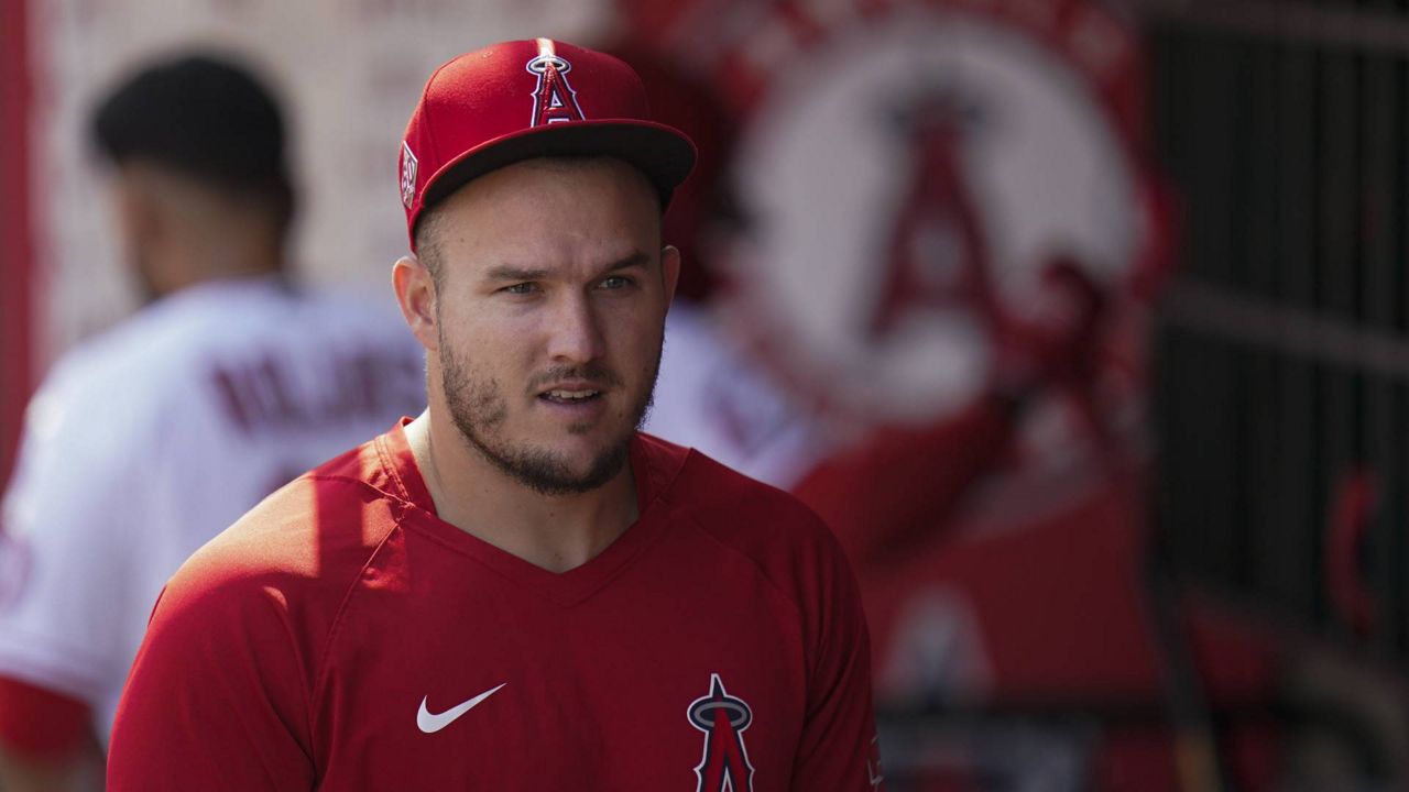 Los Angeles Angels' Mike Trout walks through the detour during a baseball game against the Oakland Athletics Monday, Sept. 20, 2021, in Anaheim, Calif. (AP Photo/Jae C. Hong)