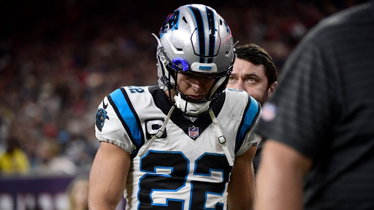 Carolina Panthers running back Christian McCaffrey (22) leaves the field during the first half of an NFL football game against the Houston Texans Thursday, Sept. 23, 2021, in Houston. (AP Photo/Justin Rex)