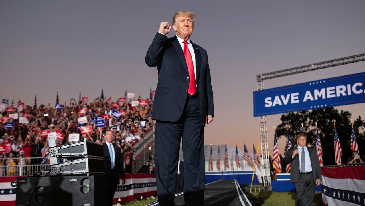 Former President Donald Trump greets supporters during his Save America rally in Perry, Ga., on Saturday, Sept. 25, 2021. (AP Photo/Ben Gray)