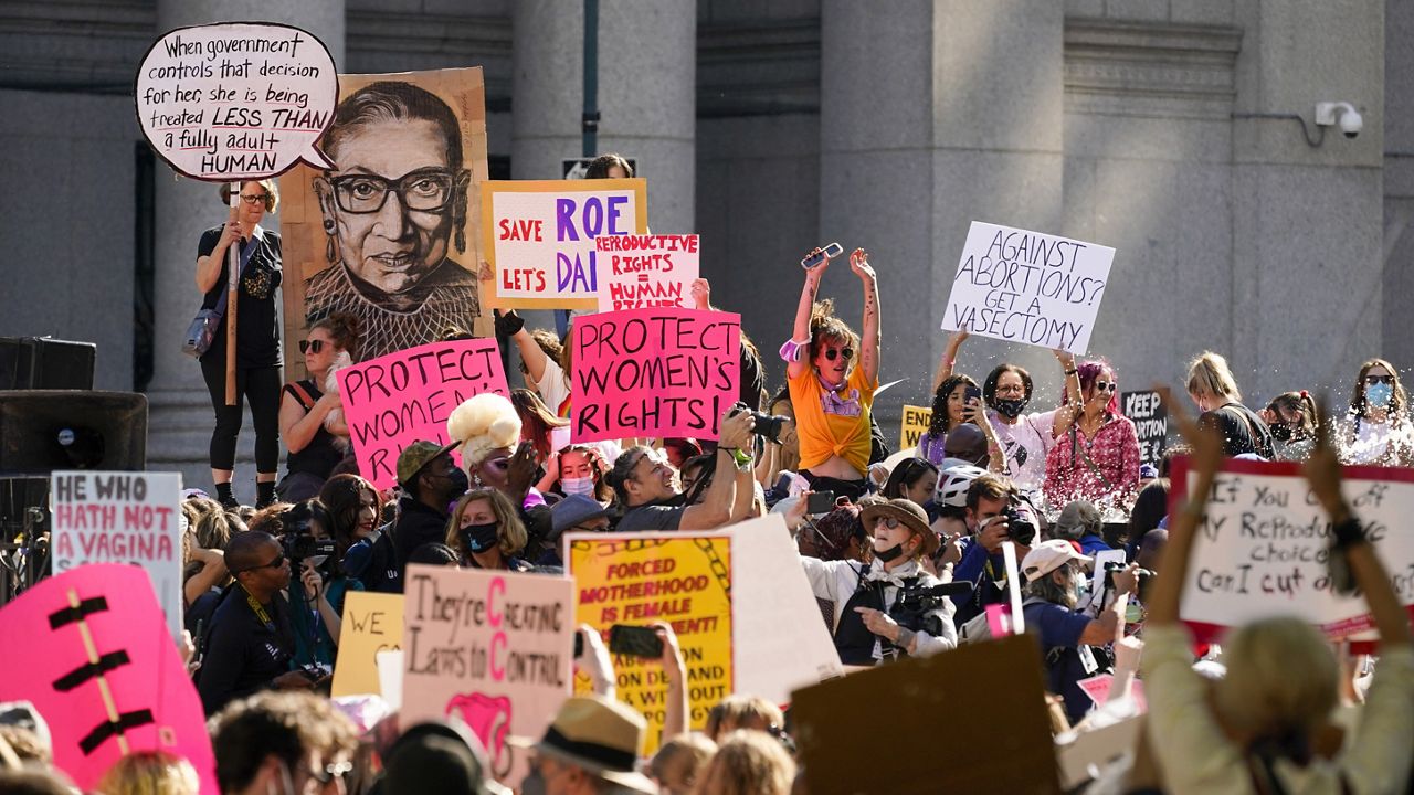 Demonstrators rally to to demand continued access to abortion during the March for Reproductive Justice, Saturday, Oct. 2, 2021, in New York. (AP Photo/Mary Altaffer)