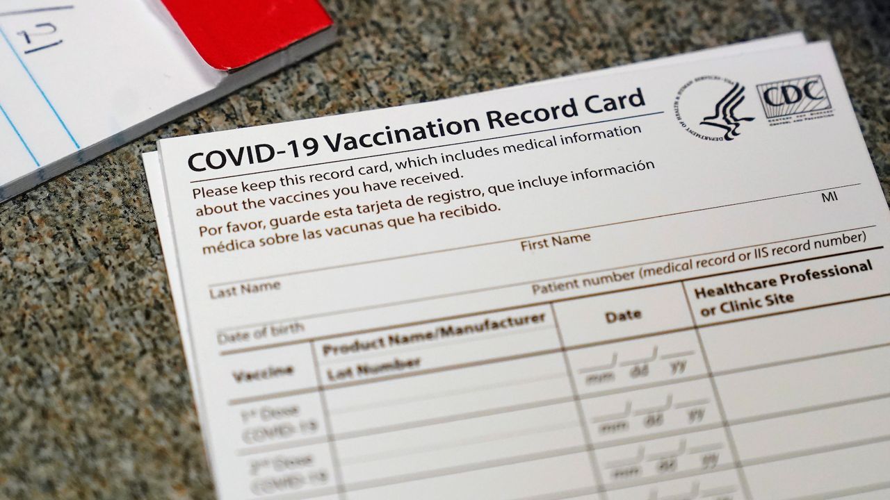What should you do with your COVID-19 vaccine card?
