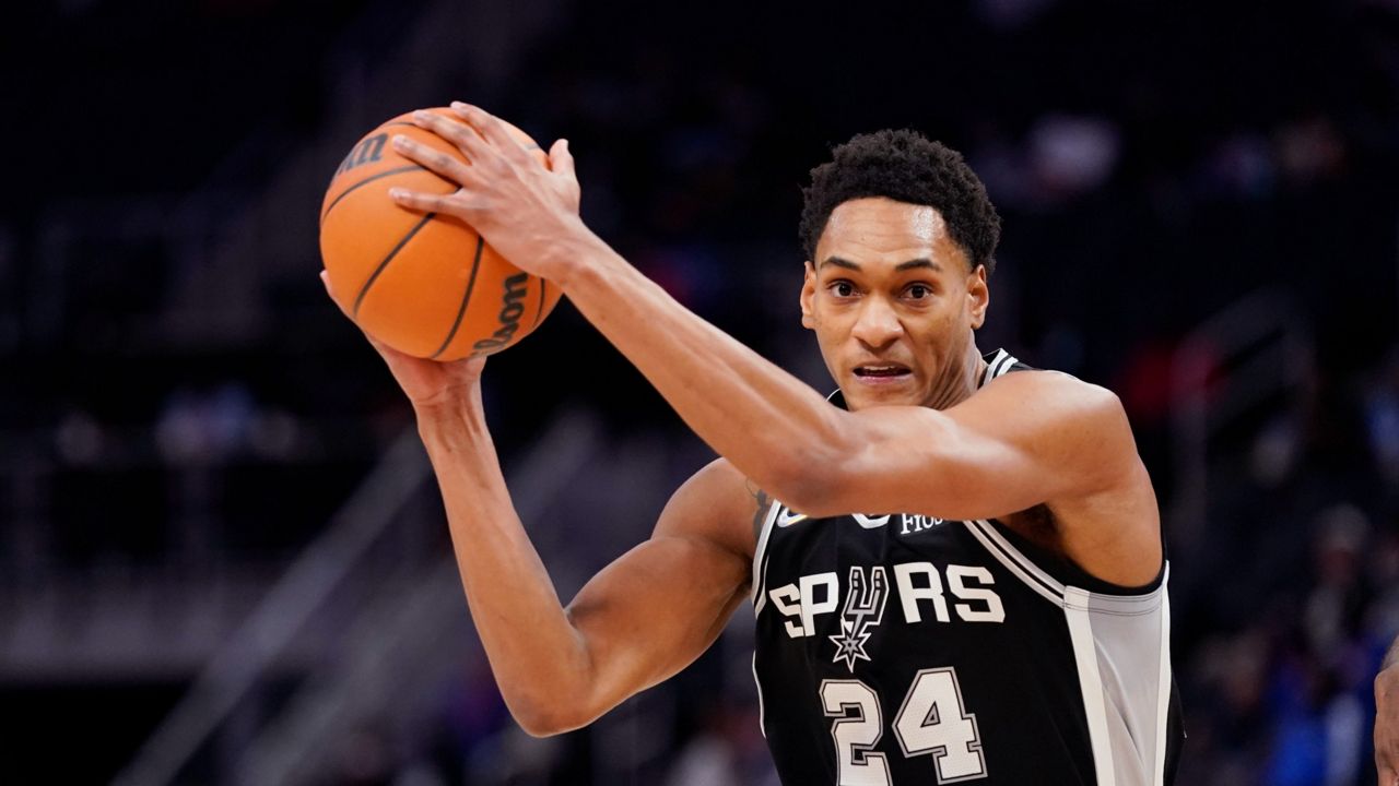 San Antonio Spurs guard Devin Vassell plays during the first half of a preseason NBA basketball game, Wednesday, Oct. 6, 2021, in Detroit. (AP Photo/Carlos Osorio)