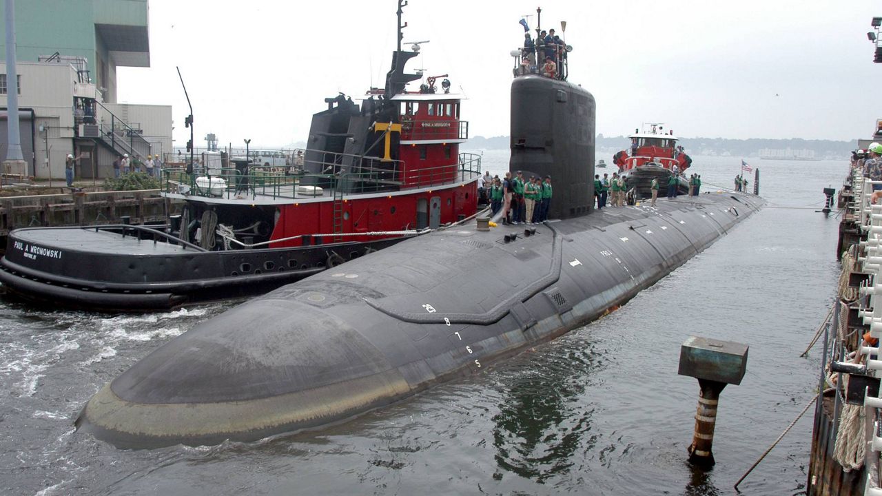 In this July 30, 2004, file photo, the USS Virginia returns to the Electric Boat Shipyard in Groton Conn., after its first sea trials. (Thiep Van Nguyen II/U.S. Navy via AP)