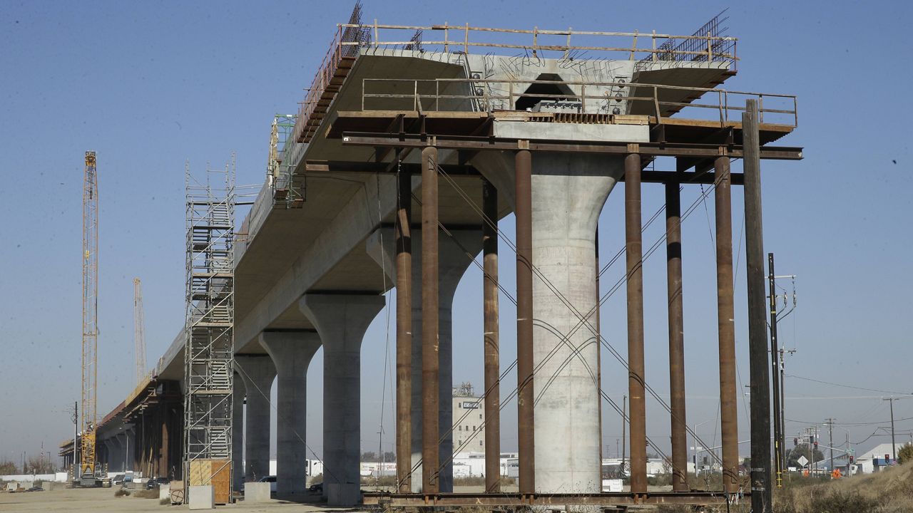 In this Dec. 6, 2017 file photo, one of the elevated sections of the high-speed rail is under construction in Fresno, Calif. (AP Photo/Rich Pedroncelli, File)