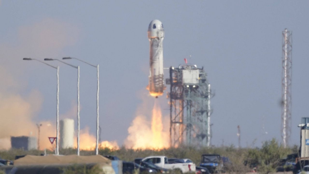 Blue Origin's New Shepard rocket launches carrying passengers William Shatner, Chris Boshuizen, Audrey Powers and Glen de Vries from its spaceport near Van Horn, Texas on Wednesday. (AP Photo/LM Otero)