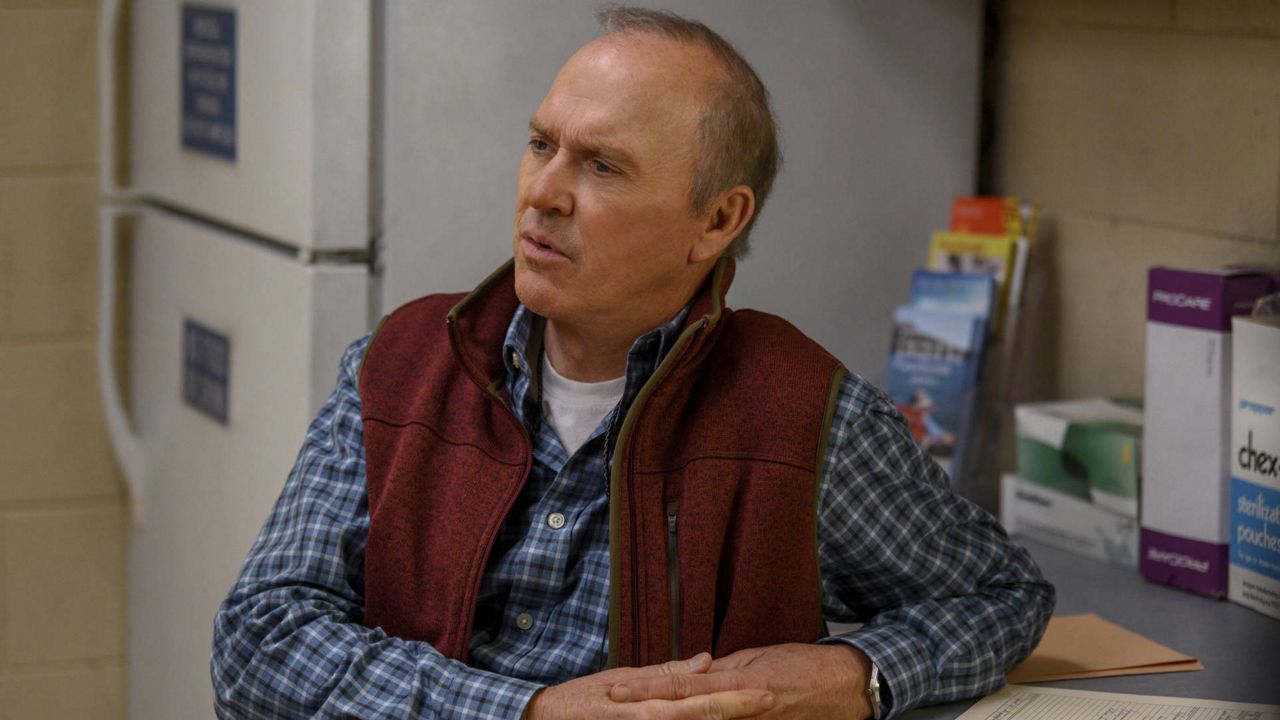 This image released by Hulu shows Michael Keaton in a scene from "Dopesick," an eight-part miniseries about America’s opioid crisis, premiering Wednesday with three episodes. (Gene Page/Hulu via AP)