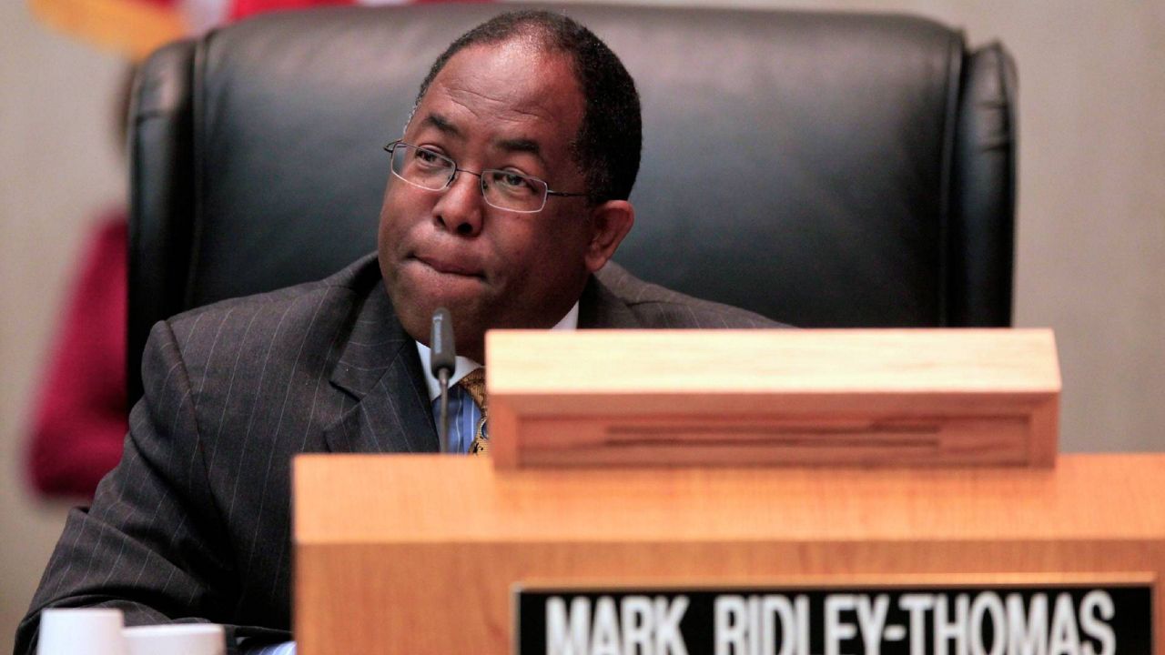 Los Angeles County Supervisor Mark Ridley-Thomas casts the deciding vote for the Board of Supervisors 3-2 vote to join the city in its economic boycott of Arizona over its SB 1070 law targeting illegal immigrants in LA., Jun 1, 2010. (AP Photo/Damian Dovarganes)