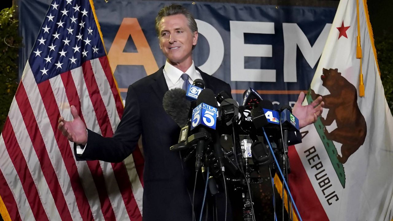 In this Sept. 14, 2021, file photo, California Gov. Gavin Newsom addresses reporters after beating back the recall attempt that aimed to remove him from office, in Sacramento, Calif. (AP Photo/Rich Pedroncelli, File)